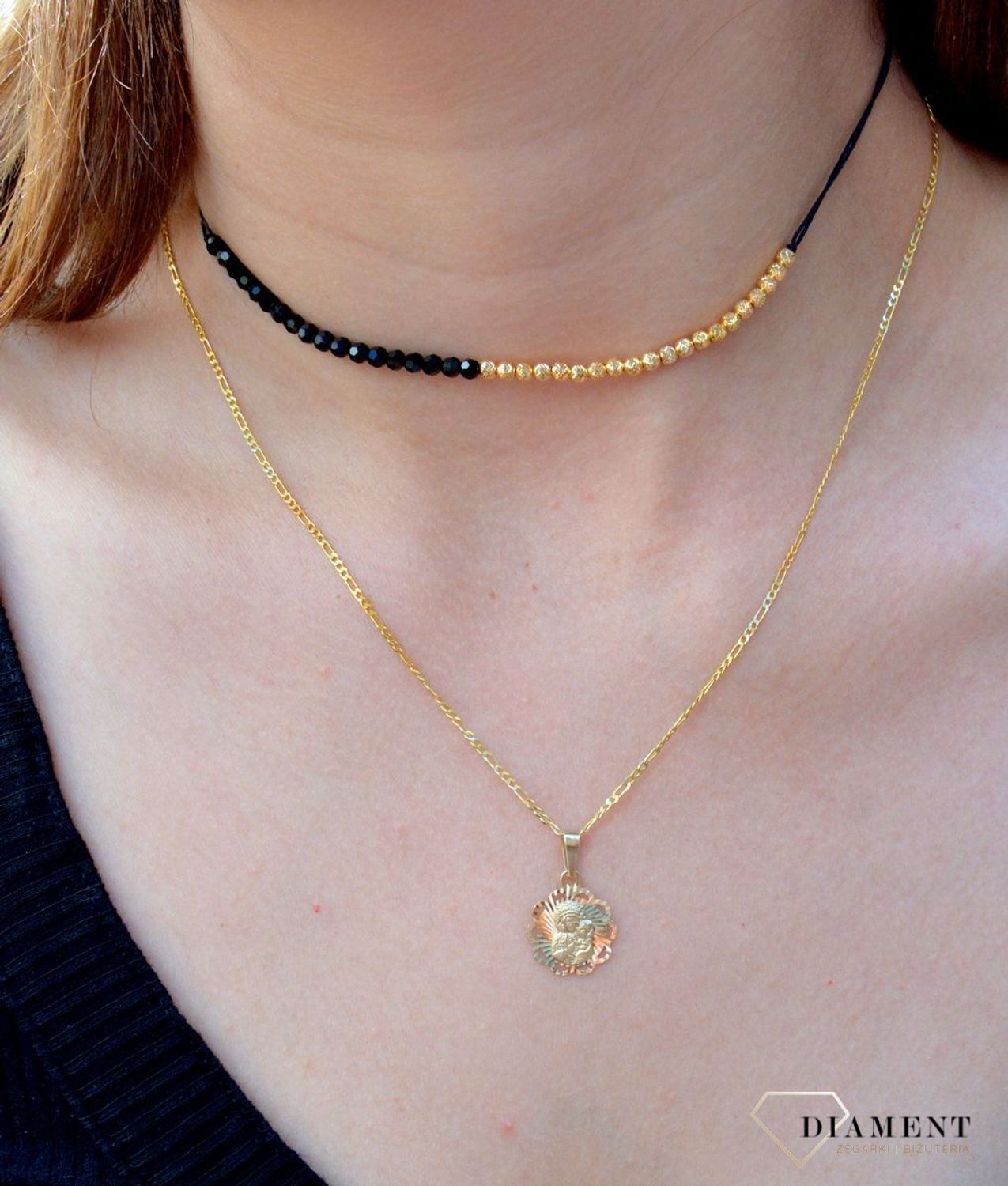 Zawieszka złota 333 medalik okrągły 'Matka Boska' ZA 6760C 333. Medalik będący wspaniałą pamiątką i prezentem z okazji chrztu, komunii czy bierzmowania. Zawieszka wykonana ze złota próby 333..jpg